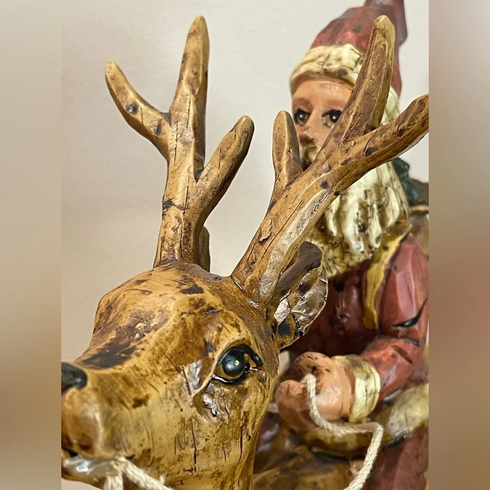 Primitive Folk Art Santa riding Reindeer 12”‎ tall chiseled resin faux wood